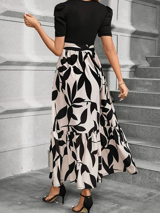 Flora – Kleid mit Blumendruck und charmantem Rundhalsausschnitt